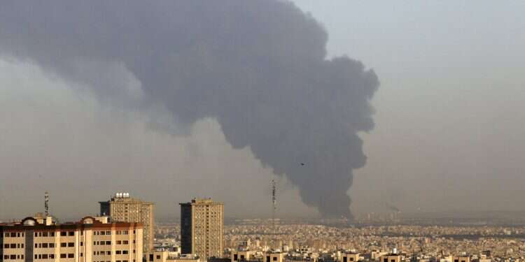 Smoke rises from Tehran's main oil refinery, June 2, 2021 Massive fire breaks out at Tehran oil refinery