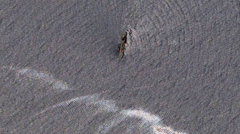 Satellite photos show wreckage of Iran's biggest warship