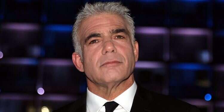 Lapid: Polish law to limit WWII restitutions 'a disgrace'