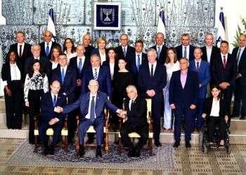 Hope, defiance greet birth of Israel's new government