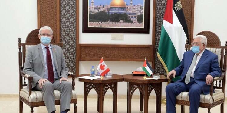 Canadian Foreign Minister Marc Garneau with PA President Mahmoud Abbas in Ramallah, July 5, 2021 Abbas calls on Canada to 'halt Israeli aggression' against Palestinians
