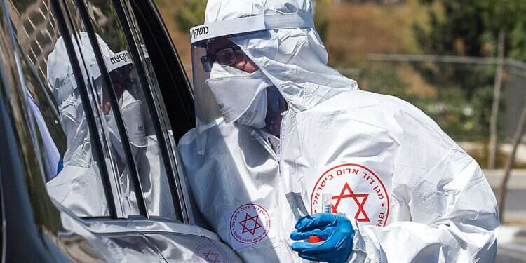 COVID tests are administered at a drive-by site in Sheikh Jarrah PM seeks criminal prosecution for COVID carriers who violate quarantine