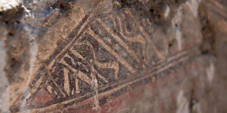 Modern Middle East politics meets ancient wall art near Hebron