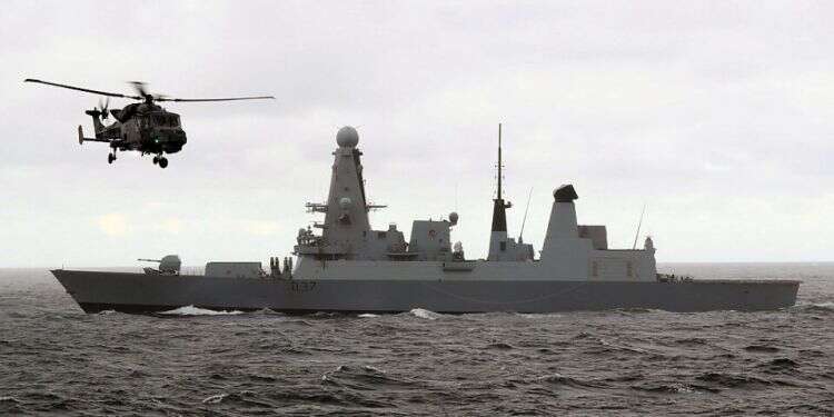 The British Royal Navy destroyer HMS Duncan, and it's Wildcat helicopter as it shadows the Russian Carrier Task Group in the English Channel, Oct. 20, 2016 Report: UK gearing up for military response over alleged Iranian attack on MV Mercer Street