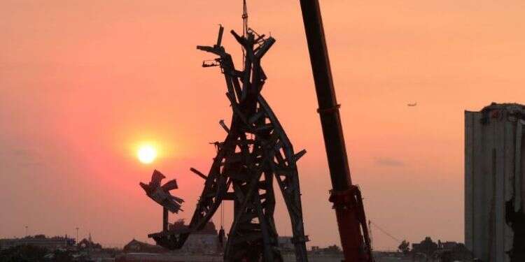 The Gesture, a 25-meter sculpture by Lebanese architect Nadim Karam to commemorate victims of last year's Beirut blast, at the capital's port in Lebanon, July 29, 2021 Memorial sculpture at Beirut port blast site draws mixed reviews