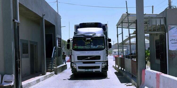 A truck passes into Rafah, in the southern Gaza Strip, May 18, 2021 Despite tensions with Hamas, Israel announces further relief measures for Gaza