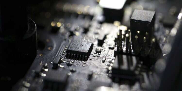 The inside of a computer Tech companies pledge billions for cybersecurity