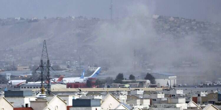 Smoke rises from a deadly explosion outside the airport in Kabul, Aug. 26, 2021 Pakistan asks Islamabad hotels to prepare for Afghan refugees