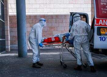 'We're at war; next 2 weeks critical,' coronavirus chief warns