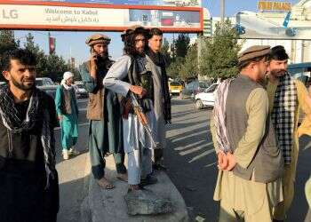A member of Taliban stands outside Hamid Karzai International Airport in Kabul, Aug. 16, 2021 (Reuters/File) In the Middle East, Taliban victory seen as lesson in waning US power