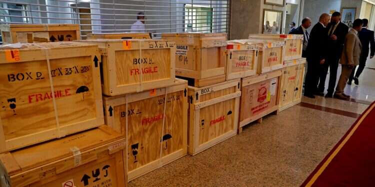 Crates containing recovered looted artifacts sit temporarily at the Iraq Foreign Ministry before being transferred to the Iraq Museum on Aug. 3, 2021 Iraq recovers its history: US returning over 17,000 looted artifacts
