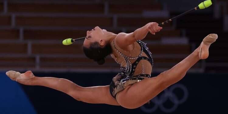 Rhythmic gymnast Linoy Ashram performing the club routine at the Tokyo Olympics, August 6, 2021 After shaky start, Israel's Linoy Ashram on road to Olympic medal