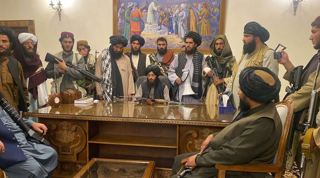 Taliban fighters take control of the Afghan presidential palace in Kabul, Aug. 15, 2021 Afghan leaders warn Taliban government cannot rule by force