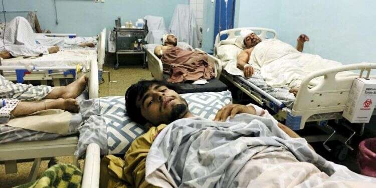 Kabul airport attack kills at least 95 Afghans, 13 US troops