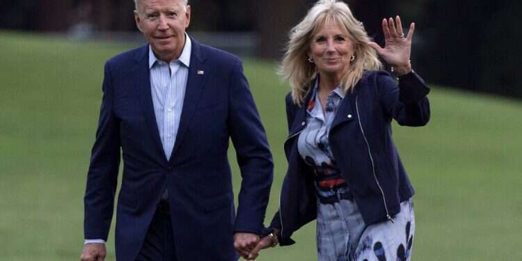 US President Joe Biden and first lady Jill Biden walk on the South Lawn of the White House, July 18, 2021
Biden wishes Jews around the world a 'good and sweet year'