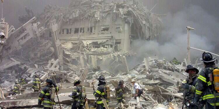 Firefighters walk through the rubble in the aftermath of the September 11 attacks US-Saudi relations take center stage as Biden moves to declassify 9/11 documents