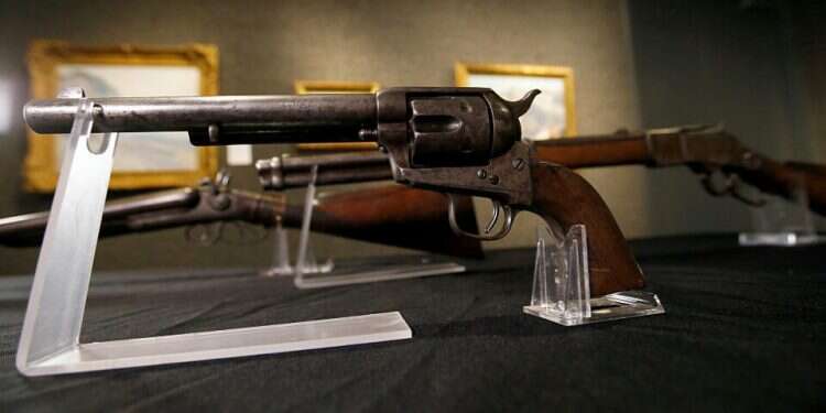 The Colt single-action Army revolver used to kill Billy the Kid is pictured during a media preview in Los Angeles, California, U.S., Aug. 5, 2021 Gun that killed Billy the Kid fetches $6M at auction