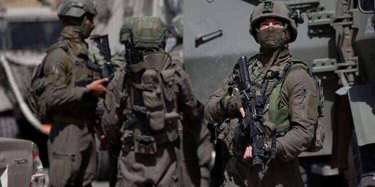 Israeli soldiers in the village of Aqraba, near the West Bank town of Nablus,, May 4, 2021 Manhunt for 6 fugitive terrorists intensifies amid Islamic Jihad threats