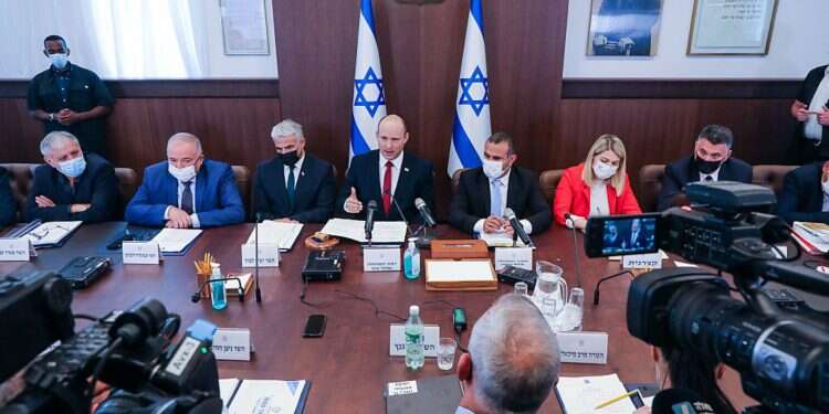 A cabinet meeting, July 11, 2021 100 days after taking office, new government struggles to effect change