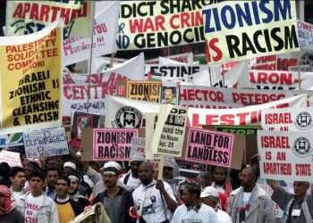 Anti-Israel signs outside the Durban Conference opening session, Aug. 31, 2001 Why was the Jewish response to Durban a failure?