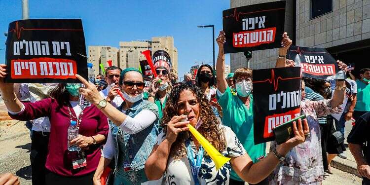 Patients 'paying with their lives' as COVID pushes hospitals over capacity