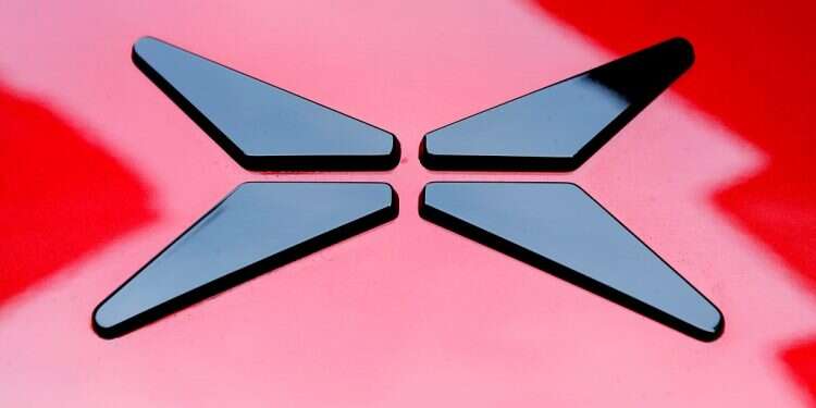 The logo on an XPeng Inc. P7 performance electric vehicle Chinese startup promises flying cars by 2024