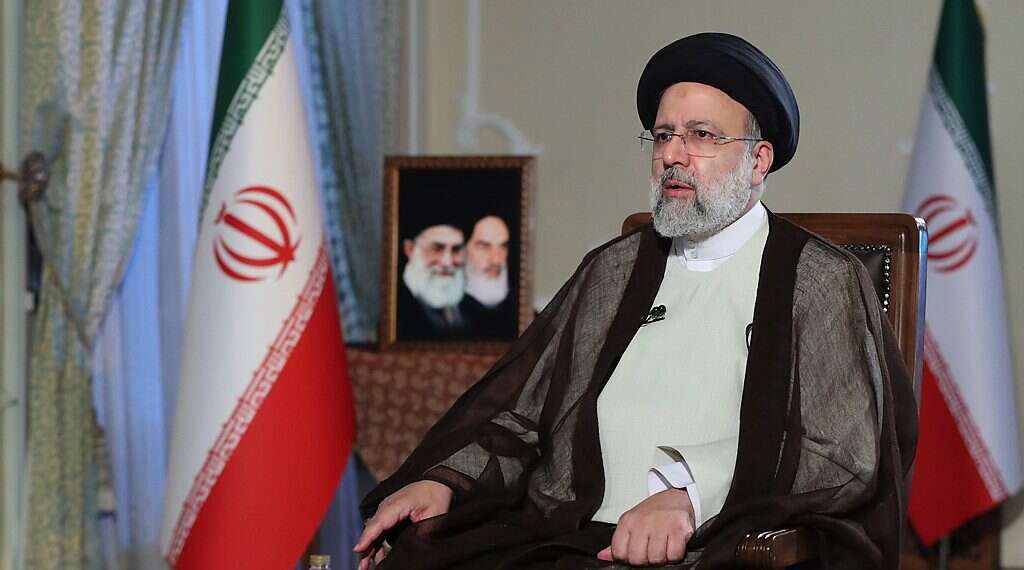 Iranian President Ebrahim Raisi speaks during a live TV interview in Tehran, Iran, 18 October 2021 Israeli officials believe Iran misleading world, wants to use talks to buy time