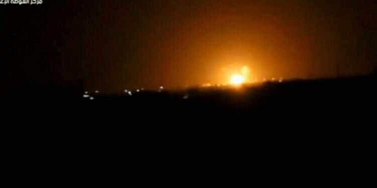 An explosion from a previous airstrike on pro-Iranian targets in Syria Israel on alert as pro-Iranian militias vow retaliation for Syrian attack