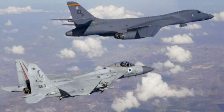 Message to Iran: IDF fighter jets escort US bomber through Israeli airspace