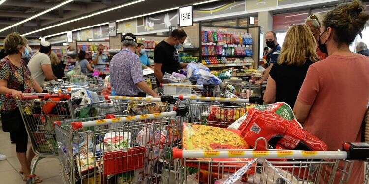 Shoppers in line at an Israeli supermarket on Sept. 25, 2021 Major Israeli food retailers under scrutiny for suspected price-fixing