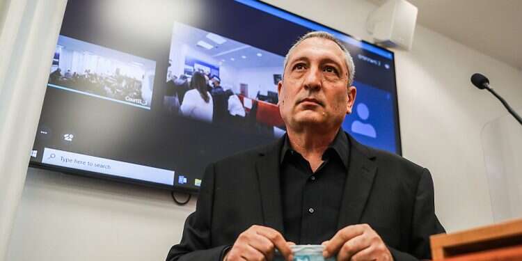 On witness stand, former Netanyahu aide describes 'monstrous' pressure