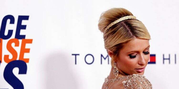 American socialite Paris Hilton arrives at the 18th annual Race to Erase MS Gala in Los Angeles, April 29, 2011 Paris Hilton dons dress by Israeli designer on wedding day