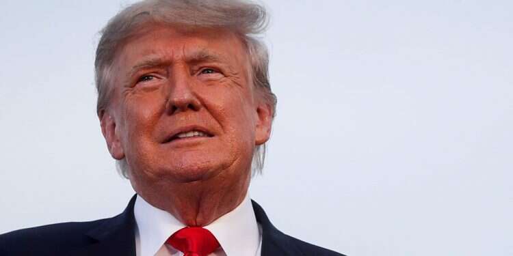 Former US President Donald Trump looks on during his first post-presidency campaign rally, June 26, 2021. Trump: Anti-Israel progressives 'controlling Congress'