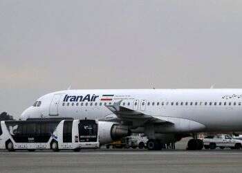 A plane belonging to Iran's national air carrier, Iran Air, at Mehrabad airport in Tehran, Feb. 7, 2016 Report: Half of Iran's civilian aircraft grounded over missing spare parts