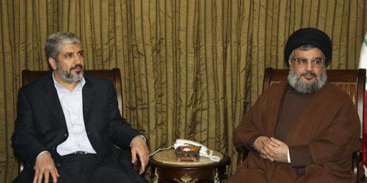 Hamas strongman Khaled Mashaal and Hezbollah leader Hassan Nasrallah Report: Iran's tentacles of evil becoming tangled