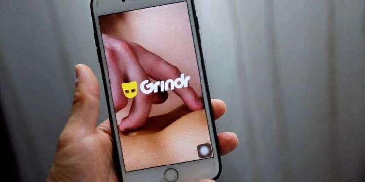 The Grindr app is seen on a mobile phone in this photo illustration taken in Shanghai, China, March 28, 2019 Dating app Grindr fined $7M for sharing users' personal data