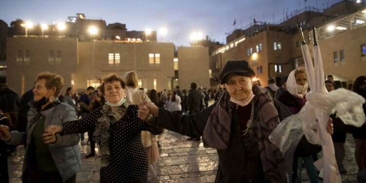 Darkness into light: Holocaust survivors celebrate Hanukkah at Western Wall