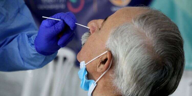 Israel confirms nearly 3,000 daily COVID cases as Omicron leads to infection spike