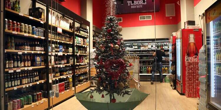 A Christmas tree is seen in a store in Jaffa, Dec. 12, 2020 Students blast Tel Aviv University plans to host Christmas market