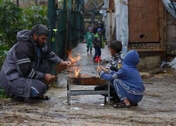 Lebanon, Syria's poorest citizens struggle to stay warm in snowstorm