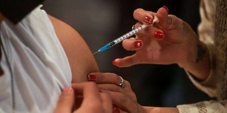 Government advisory panel recommends 4th COVID vaccine dose for all adults