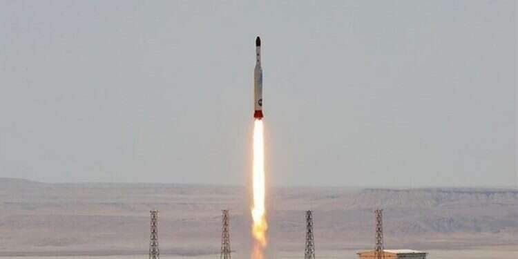 A health official checks the body temperature of worshipers in Tehran, Oct. 22, 2021 In threat to Europe, Iran increases ballistic missile range