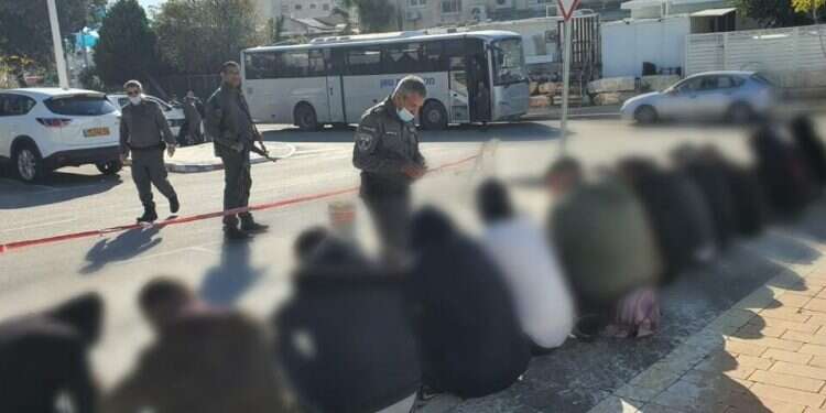 Some of the 30 Negev residents arrested on Jan. 18, 2022 are seen in police custody 13 suspects in Negev riots to face criminal charges, police say
