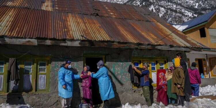 WHO head says 'worst of COVID' could be over in 2022