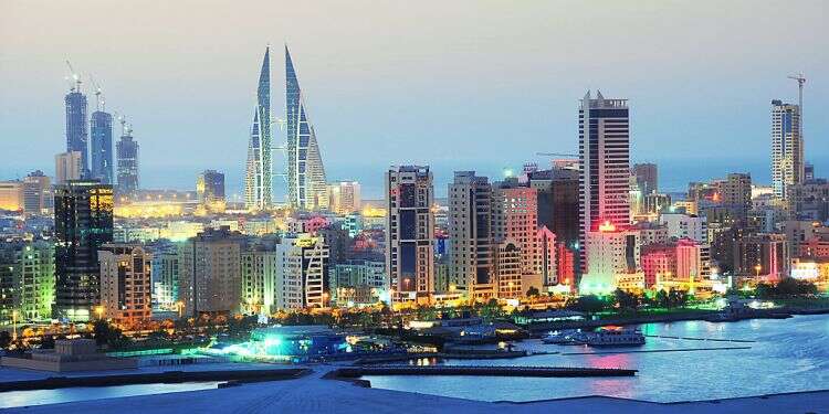 Night shot of the central business district of Bahrain Bahrain introduces permanent residency visas to lure talent