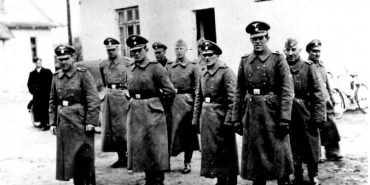 Nazi guards at Belzec death camp in occupied Poland in 1942 Holocaust survivors up in arms over planned auction of Nazi memorabilia