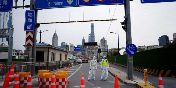 Shanghai is home to 26 million residents Shanghai locks down as COVID surges in China's financial hub