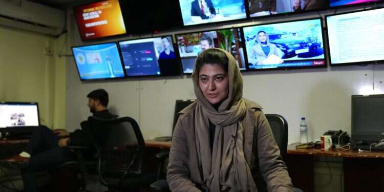 Afghan journalist Banafsha Binesh gives an interview to the Associated Press, at TOLO TV newsroom in Kabul, Feb. 8, 2022 Taliban's arrest of 3 journalists sparks international outcry