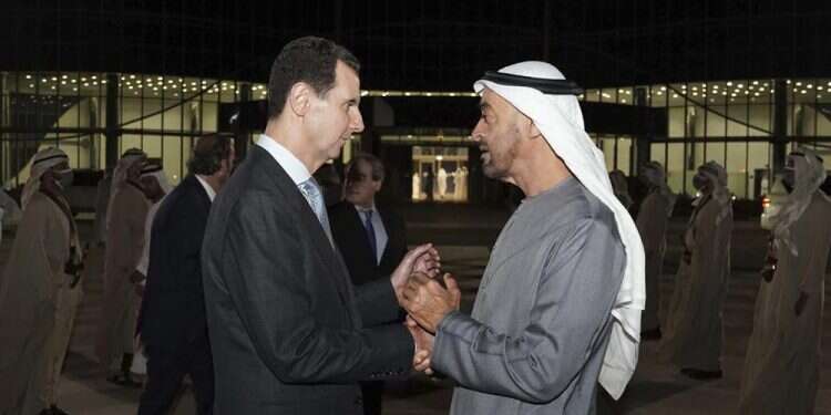 Syrian President Bashar Assad, left, speaks with Abu Dhabi's Crown Prince, Sheikh Mohammed bin Zayed Al Nahyan, in Abu Dhabi, United Arab Emirates, Friday, March 18, 2022
Syria's Assad visits UAE, 1st trip to Arab country since war