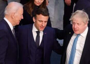 US President Joe Biden (left), French President Emmanuel Macron (center) and UK Prime Minister Boris Johnson (right) arrive at a NATO summit at the Alliance headquarters in Brussels, Belgium, March 24, 2022 US, Western allies eye 'long-term game plan' on Russia